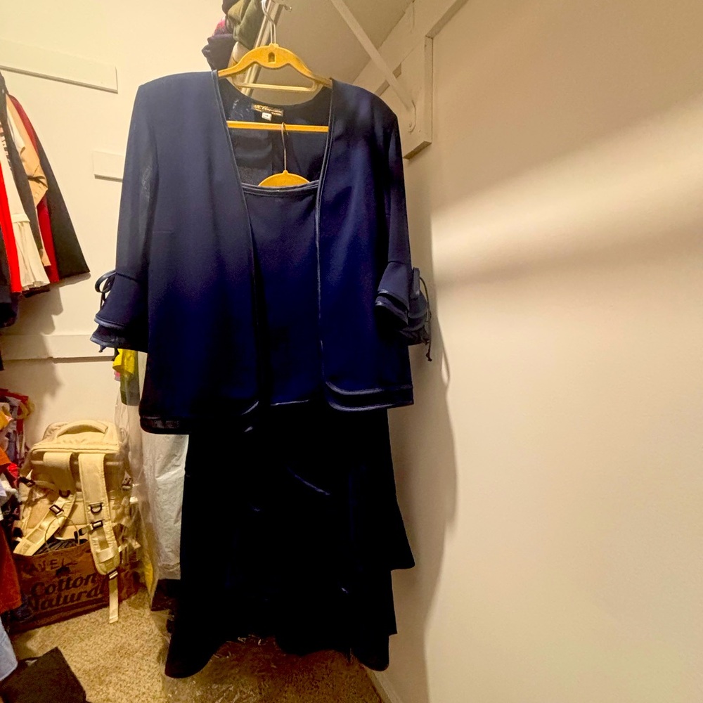 Elegant Navy Blue Top and Skirt with Matching Jacket